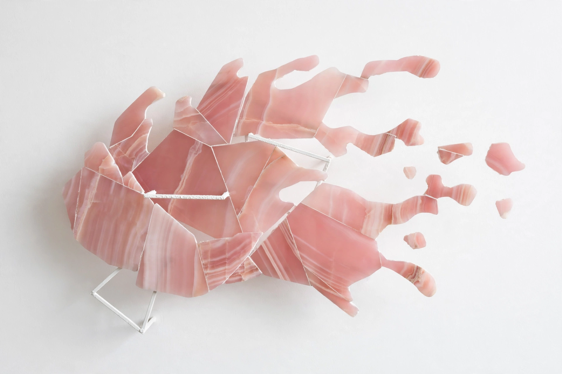Blush — a pink onyx splash dissolving into scattered fragments.